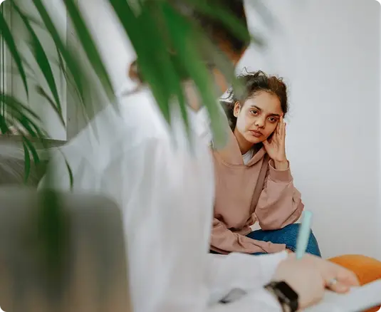 Woman reflecting during emotional transition and self-discovery